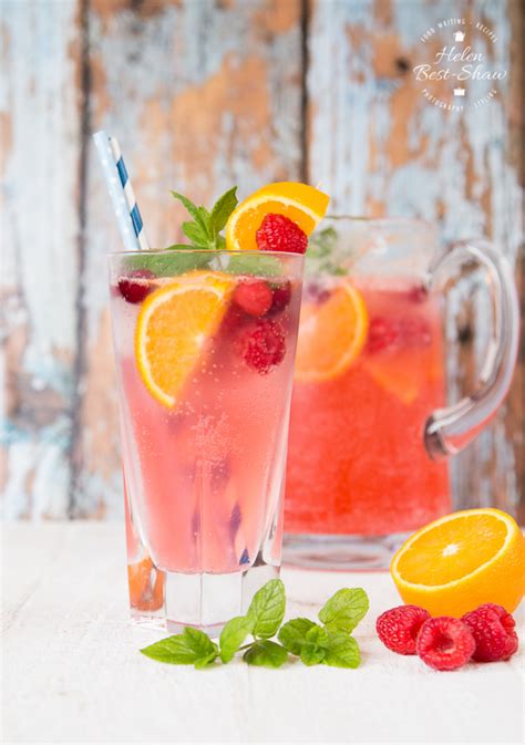 cranberry-raspberry-and-orange-sparkling-mocktail image
