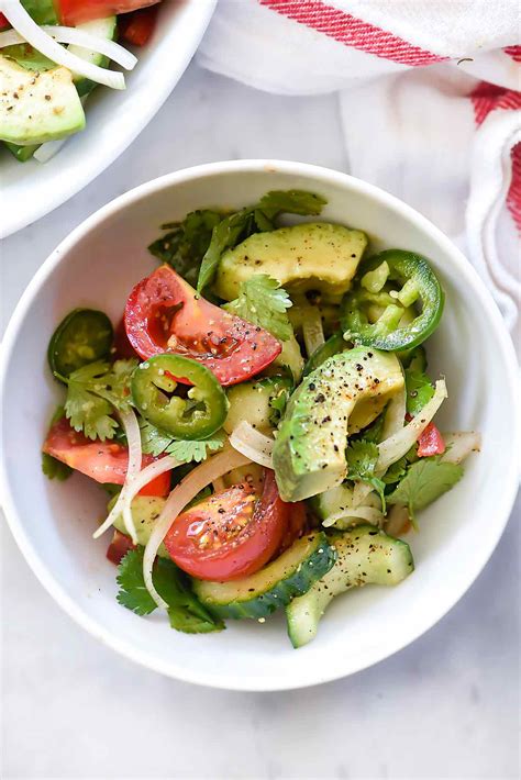 tomato-avocado-cucumber-and-maui-onion-salad image