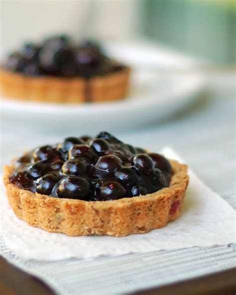 fresh-blueberry-tarts-recipe-pinch-of-yum image