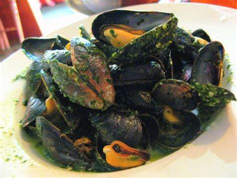 mussels-in-a-white-wine-reduction-with-pesto-sauce image