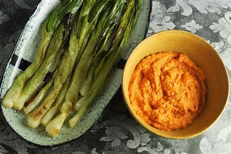 grilled-spring-onions-with-romesco-sauce image