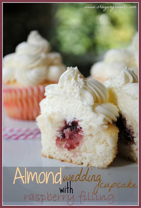 almond-wedding-cake-cupcakes-with-raspberry-filling image