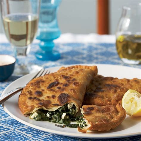 greek-hand-pies-with-greens-dill-mint-and-feta image
