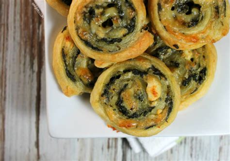 cheesy-spinach-pinwheels-emily-bites image