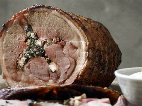 stuffed-lamb-with-spinach-and-pine-nuts image