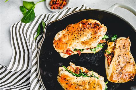 sun-dried-tomato-spinach-and-cheese-stuffed-chicken image