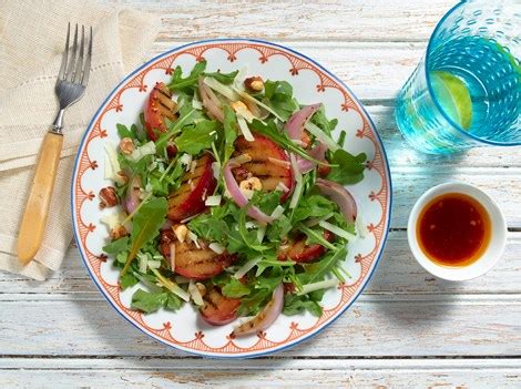 arugula-salad-with-grilled-plums-and-manchego image