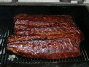 barbecue-ribs-with-a-chipotle-raspberry-bbq-sauce image