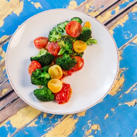 roasted-broccoli-and-cherry-tomatoes-so-delicious image