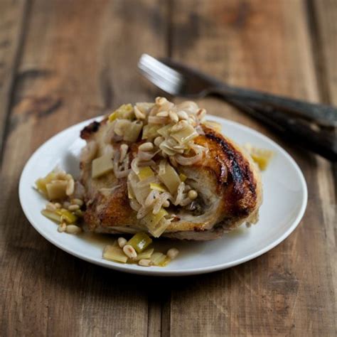 chicken-breasts-with-leeks-and-pine-nuts-food-wine image