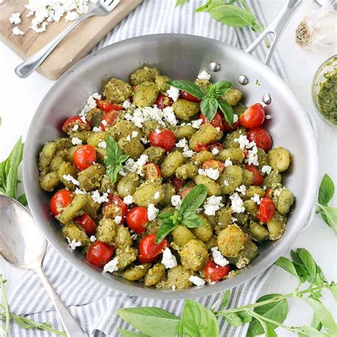 pesto-gnocchi-with-goat-cheese-and-cherry-tomatoes image