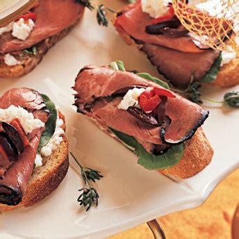 roast-beef-and-arugula-crostini-with-olive-red-pepper image