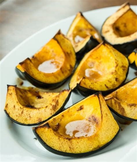 baked-acorn-squash-with-maple-syrup-butter-good image