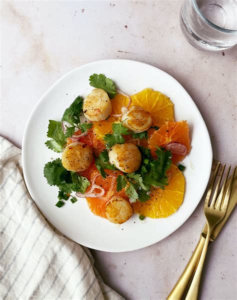 seared-scallops-with-citrus-shallot-salad-purewow image