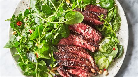 steak-with-tangy-sauce-and-watercress-salad image