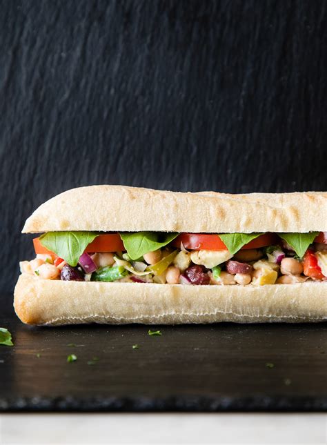 veggie-pan-bagnat-nicoise-salad-sandwich image