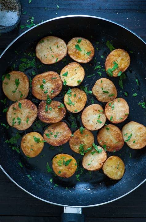 pan-braised-baby-potatoes-with-rosemary-and-garlic image