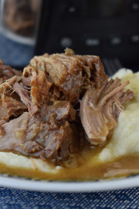easy-slow-cooker-pork-roast-recipe-these-old image