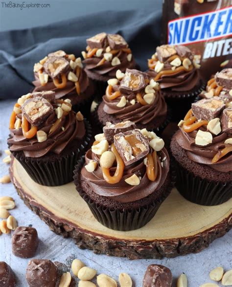 snickers-cupcakes-the-baking-explorer image