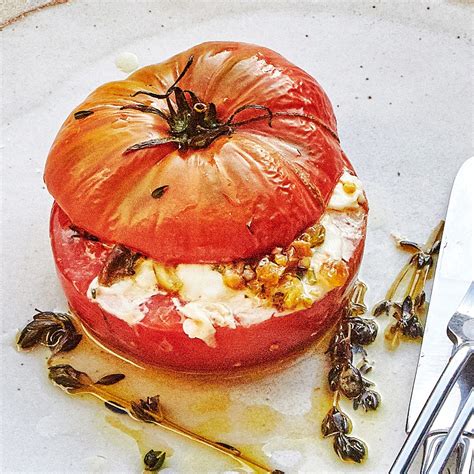 cheesy-stuffed-tomatoes-recipe-bon-apptit image