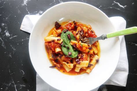 the-best-penne-with-tomatoes-italian-sausage-olives image