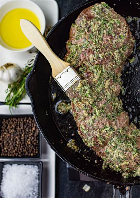 herb-crusted-beef-tenderloin-roast-with-bearnaise-sauce image