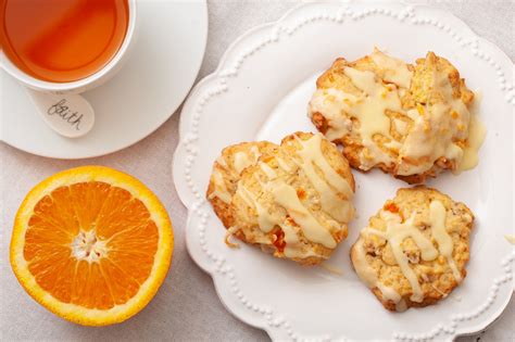 carrot-cookies-with-orange-icing-recipe-the-spruce image