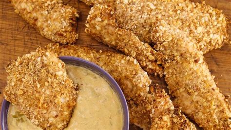 dijon-saltine-and-wheat-germ-crusted-chicken-fingers image