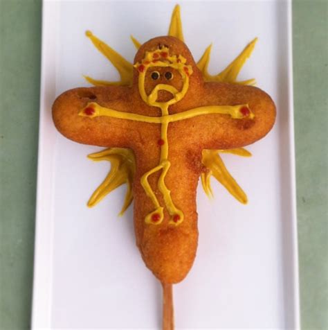 crucifixion-corn-dogs-mustard-decorated-food-on-a-stick image