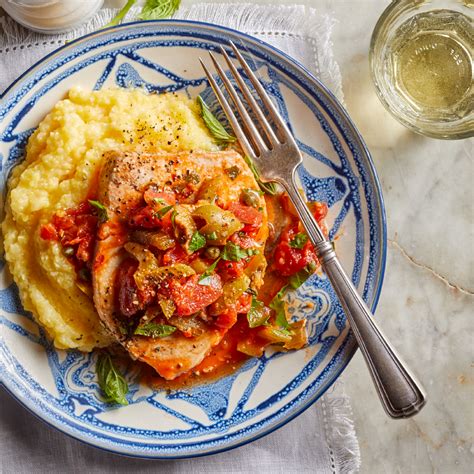 swordfish-with-olives-capers-tomatoes-over-polenta image