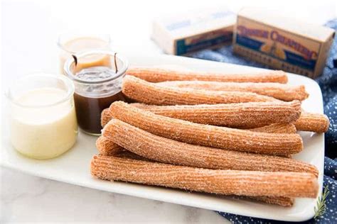 churros-with-dessert-dipping-sauces-sense-edibility image