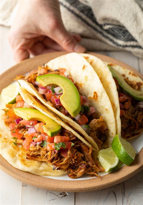 best-slow-cooker-carnitas-video-a-spicy-perspective image