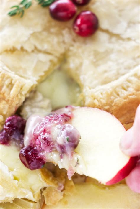 baked-brie-in-puff-pastry-with-cranberry-sauce-savor-the image