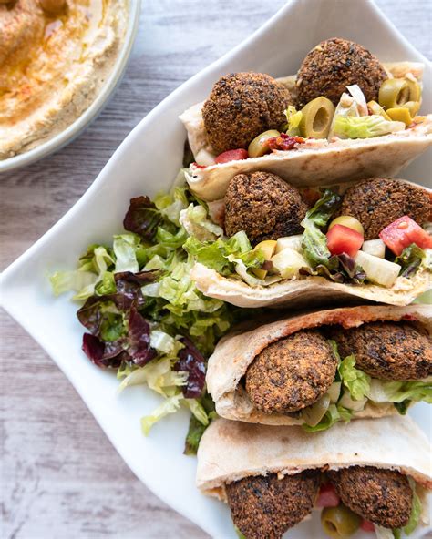 falafel-pita-sandwich-six-hungry-feet-middle-eastern-inspired image