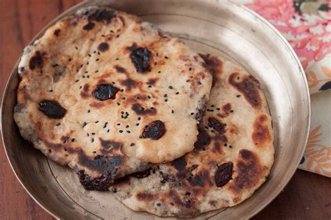 cranberry-whole-wheat-naan-recipe-by-archanas image
