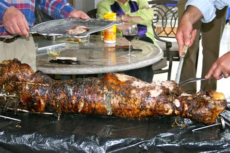 how-to-roast-a-whole-lamb-on-a-spit-the-spruce-eats image