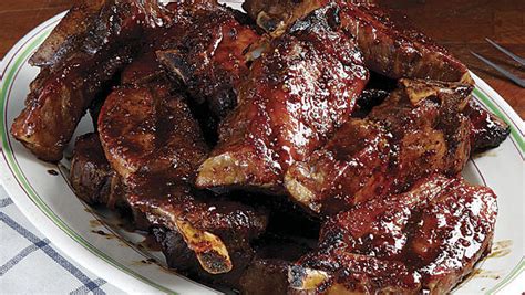 braised-country-style-pork-ribs-with-mustard-beer-sauce image