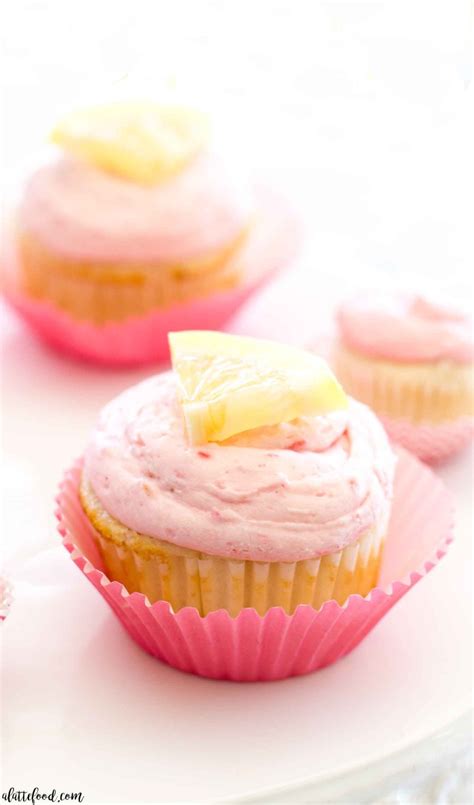 lemon-cupcakes-with-lemon-curd-and-raspberry image