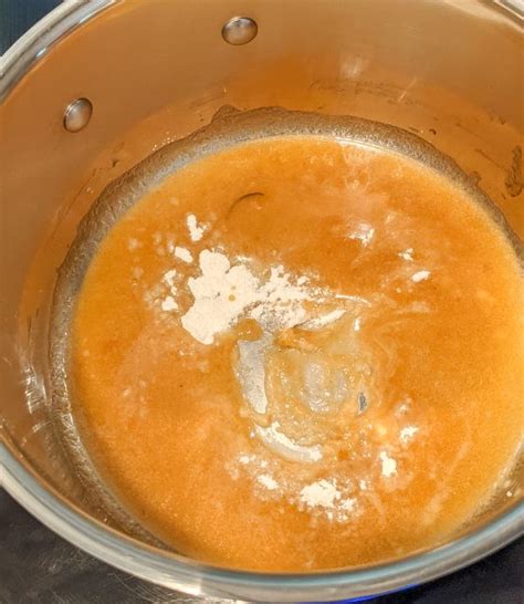 how-to-make-easy-turkey-gravy-with-drippings-or-stock image