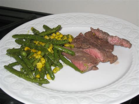 skirt-steak-with-haricots-verts-corn-and-pesto image