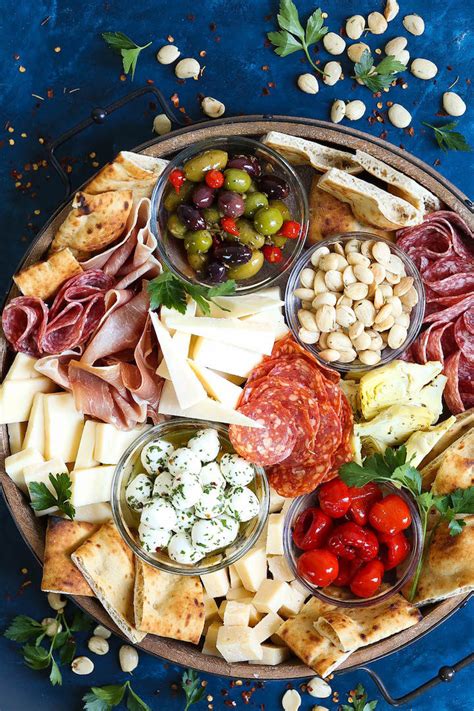 antipasto-appetizer-cheese-board-damn-delicious image