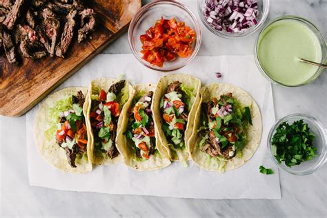 skirt-steak-tacos-with-cilantro-lime-sour-cream image