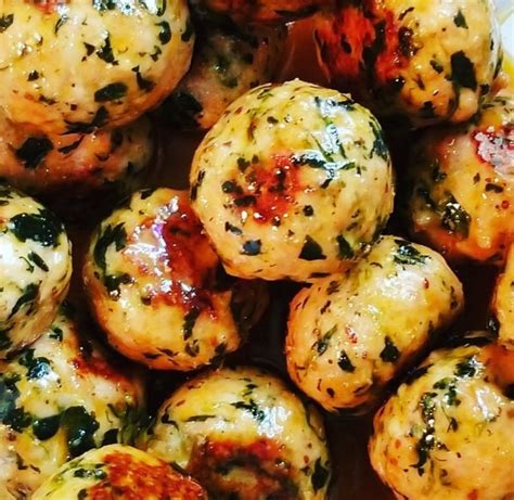 pork-and-spinach-meatballs-with-a-glass-of-wine image