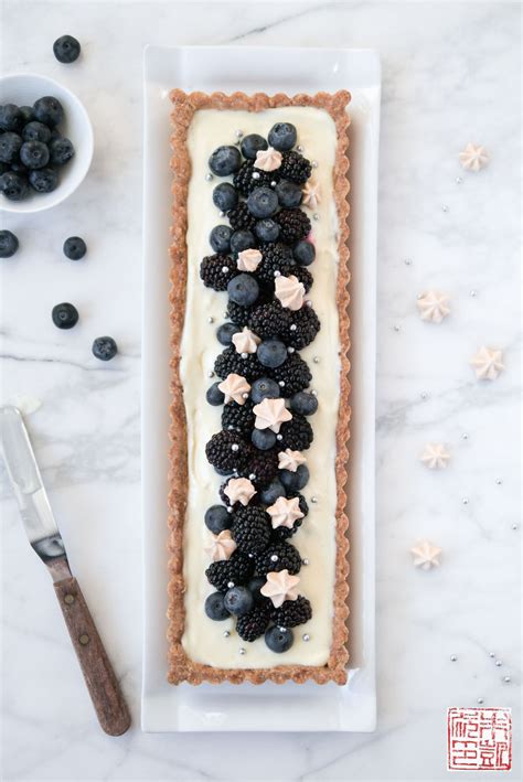 french-blueberry-lemon-curd-tarts-dessert-first image