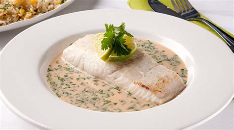 baked-halibut-with-coconut-lime-and-cilantro-sauce image