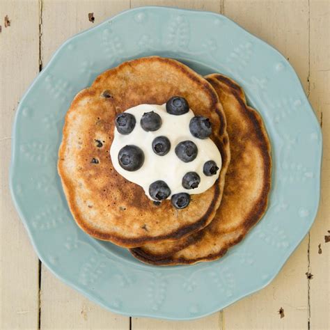 blueberry-pecan-pancakes-recipe-eatingwell image