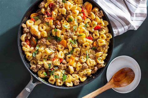 skillet-tortellini-with-sausage-and-cherry-tomatoes image