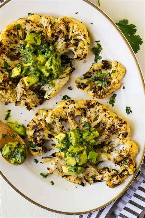 cauliflower-steak-with-herby-avocado-sauce-well-plated image