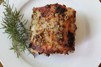 herb-and-garlic-roasted-pork-loin-tasty-kitchen image