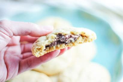 nutella-stuffed-sugar-cookies-tasty-kitchen image